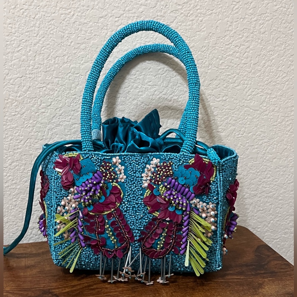 Vibrant Blue and Purple Mini Bag with Seahorse Embellishments